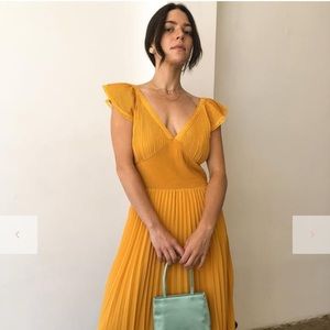 Lisa Says Gah Anoki Saffron dress